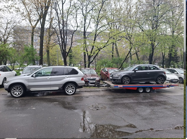 Šlep služba Nešo prevozi oštećeno vozilo sa parkinga u naselju